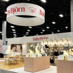 custom Baby Bjorn exhibit booth installation at ABC Kids Expo 2026 in Las Vega